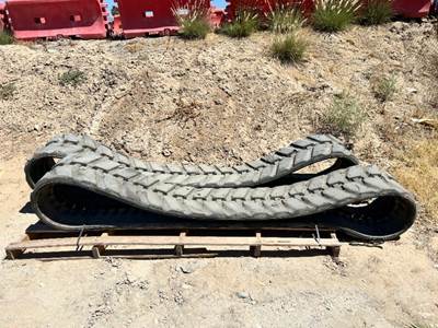 SET OF RUBBER TRACKS --(LOCATED IN COLTON, CA)--