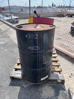 PPROX. (2) 50 GALLON METAL DRUMS, HAND PUMP --(LOCATED IN COLTON, CA)--