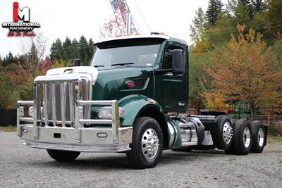 2023 Peterbilt 567 Tandem Day Cab with Steerable Drop Axle
