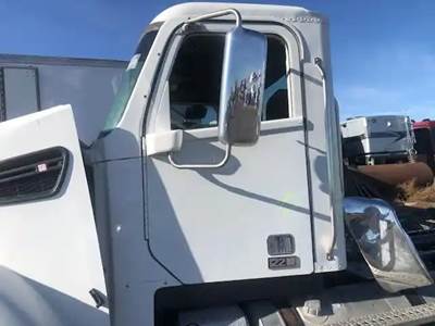 Freightliner Coronado 122 SD Left Door for a 2015 Freightliner 122SD