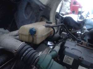 Volvo VNL Radiator Overflow Bottle / Surge Tank