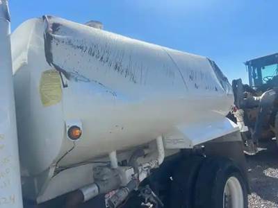 Used 2000 Gal Tank, Bent Up But Useable, Has All Hardware & Pumps