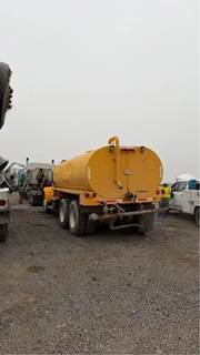 16FT Water Tank Bed 3500 Gal, Has Damage And Dents. Hydraulic Driven Pump/ Has