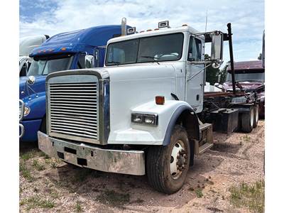 Freightliner FLD120SD Roll Off Truck - 475HP