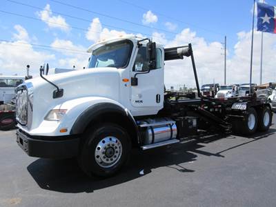 International HX Roll Off Truck - Cummins, 485HP, Automatic