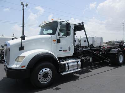 International HX Roll Off Truck - Cummins, 485HP, Automatic