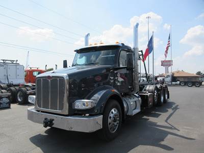 Peterbilt 567 Tri Axle Roll Off Truck - Cummins, 525HP, 12 Speed Endurant Automatic