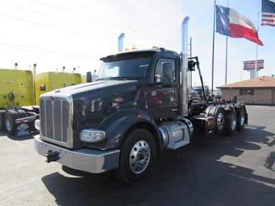 Peterbilt 567 Tri Axle Roll Off Truck - Cummins, 525HP, 12 Speed Endurant Automatic
