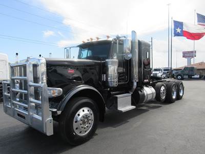 Peterbilt 389 Tri Axle Sleeper Semi Truck - 48" Flat Top Sleeper, Cummins 565HP, 18 Speed Manual