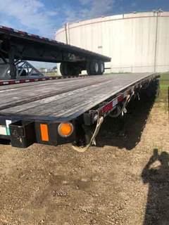 Fontaine 48x102 Steel Flatbed Trailer - Spring, Sliding Axle