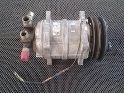 A/C Compressor With A Double V-Belt Pulley, 4 Bolt Mounting Configuration And