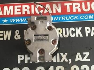 Used A/C Compressor For A Isuzu 4HK1-TC Engine