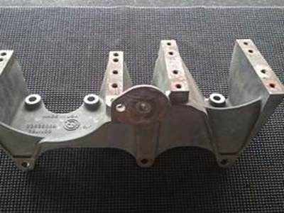 Accessory Bracket For The Alternator And A/C Compressor From A Detroit Diesel 14