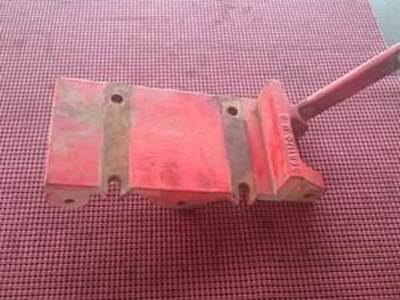 A/C Compressor Bracket For A Cummins ISX Engine