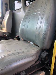 Good Used Driver Side SeAt For A 1997 Freightliner FL70