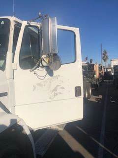 Good Used Driver Side Door With MAnuAl Windows For A 2000 Freightliner FL70