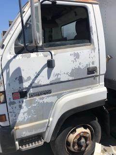 Good Used Driver Side Door Assembly With MAnuAl Windows For A 1992 GMC W5500