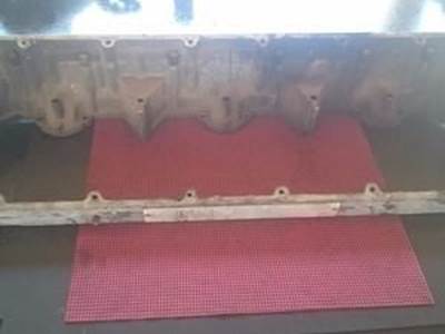 Intake Valve Cover Spacer For A Cummins M11 Engine