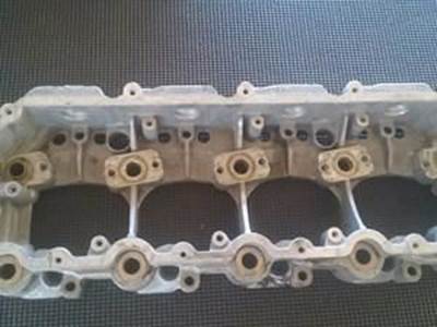 Intake Valve Spacer For An International 6.0L Engine