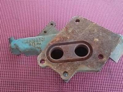 Water Supply Bracket For An International DT466B Engine