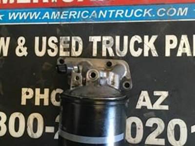 Used Oil Filter Housing And Filter For A Isuzu 4HK1-TC Engine