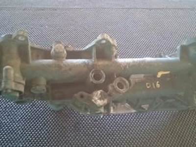 Triple Oil Filter Base For A Volve D16 Engine