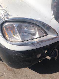 Good Used PAssenger Side HeAdlight Assembly With Bezel For A 2009 Freightliner