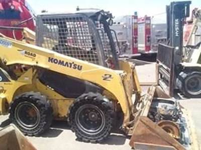 Load 1.KOMATSU  Model #SK820 Serial # A40092. LD0097