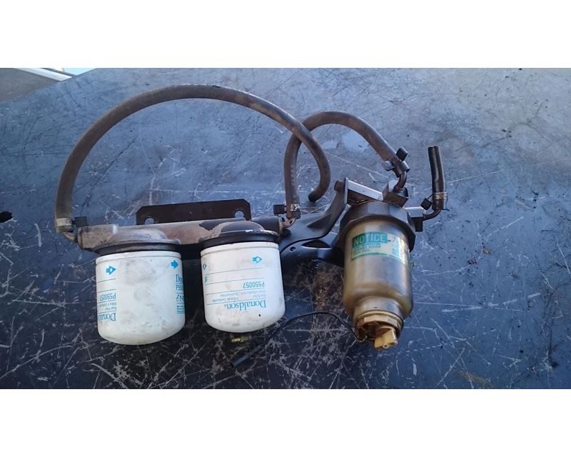 Used Fuel Water Separator With Two Fuel Filters For 1987 Isuzu Npr For