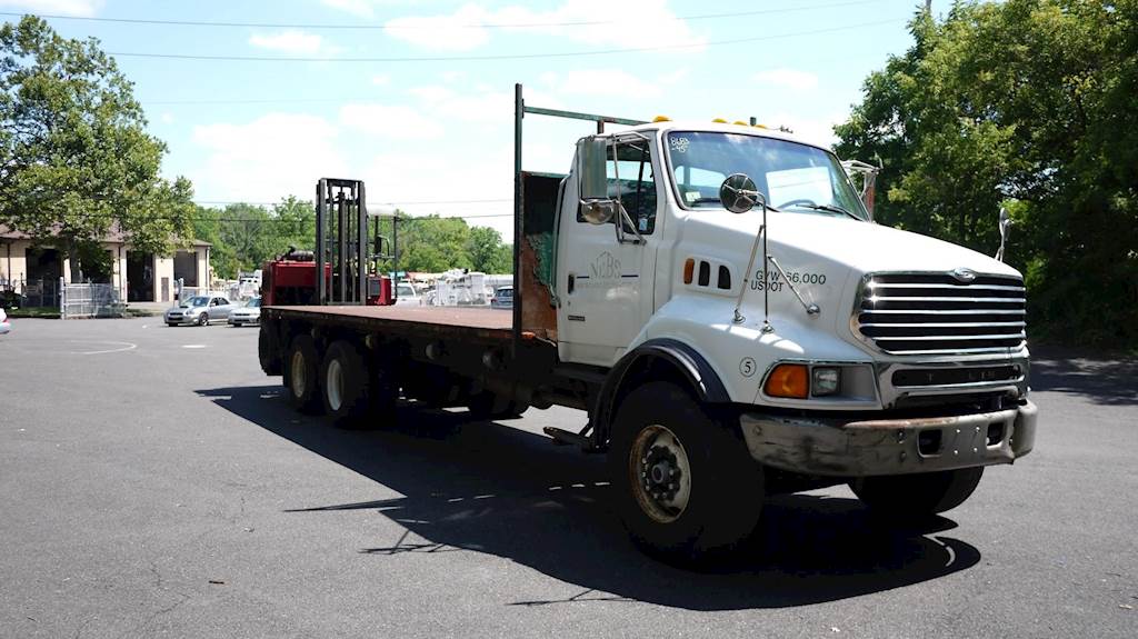 2003 Sterling LT9500 Flatbed Truck with Moffett M5000 Piggyback Forklift For Sale, 184,559 Miles
