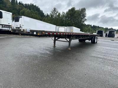 Fontaine 48x102 Steel Flatbed Trailer - Spring, Sliding Axle