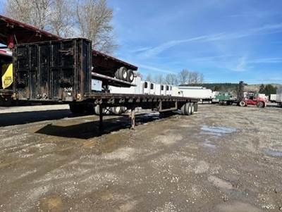 Trailmobile 53x102 Steel Flatbed Trailer - Spring, Sliding Axle