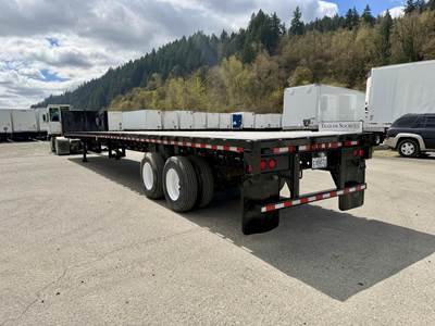 Trailmobile 53x102 Steel Flatbed Trailer - Spring, Sliding Axle
