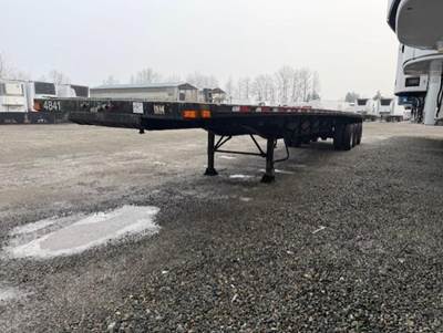 Transcraft 48x102 Tri Axle Steel Flatbed Trailer - Spring, Fixed Axle