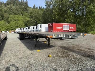 Transcraft 48x102 Steel Flatbed Trailer - Air Ride, Sliding Axle