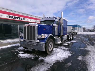 Peterbilt 389 Tri Axle Sleeper Semi Truck - 72" Flat Top Sleeper, Cummins 605HP, 18 Speed Endurant Amt