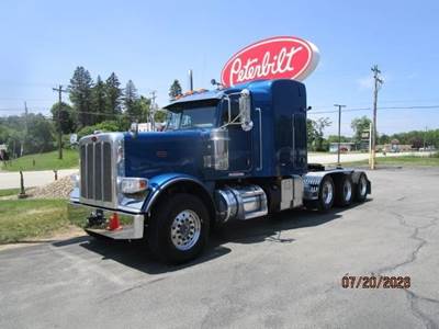 Peterbilt 389 Tri Axle Sleeper Semi Truck - 70" Mid Roof Sleeper, Cummins 605HP, 18 Speed Manual