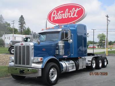 Peterbilt 389 Tri Axle Sleeper Semi Truck - 70" Mid Roof Sleeper, Cummins 605HP, 18 Speed Manual