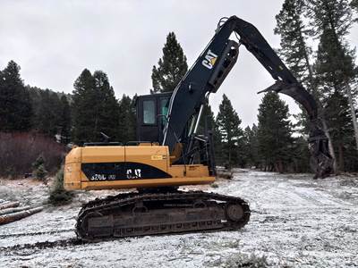2015 Caterpillar 320D FM Trailer-Mounted Log Loader - Grapple
