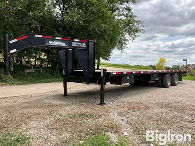 2013 Finish Line 32’ T/A Gooseneck Flatbed Dually Trailer w/Hydraulic Dovetail