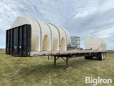 1987 Freuhauf 48’ T/A Flatbed Sprayer Tender Trailer
