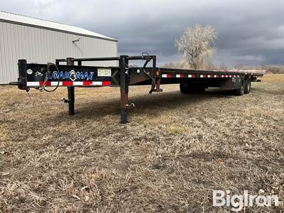 2014 Load Trail LoadMax 34’ T/A Dually Flatbed Trailer w/Hydraulic Dovetail