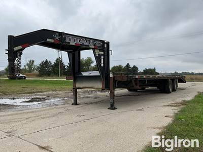 2012 Titan 30’ T/A Dually Gooseneck Flatbed Trailer