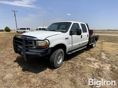 1999 Ford F350 4x4 Crew Cab Flat Bed Pickup w/Compressor