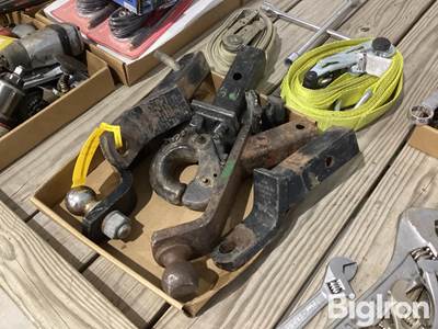 Assortment of Trailer Hitches and Straps