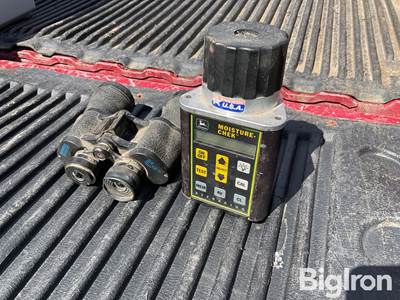 Binoculars and John Deere Moisture Tester