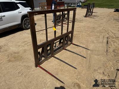 Used 4 Prong Bale Spear Attachment with 33" Spears