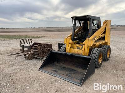 Gehl 6625 SX Skid Steer w/Tracks, (2) Buckets, Bale Spear, & Pallet Forks