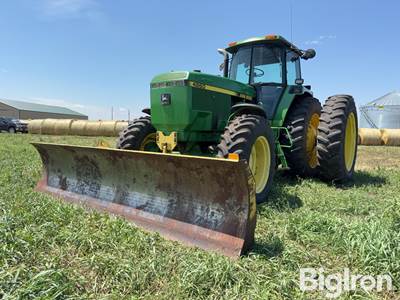 John Deere 4960 MFWD Tractor w/12' Degelman Dozer