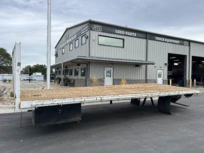 24'L 103"W Flatbed, Wood Deck, Fixed Headache Rack, Under Mounted Tool Box, Rub